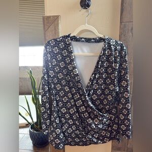 Ann Taylor neutral wrap top with geometric floral design